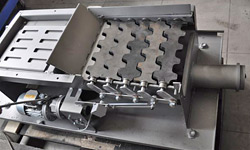 Entaschung und Brennerreinigung durch einen Drehkammrost Kammrost geschlossen